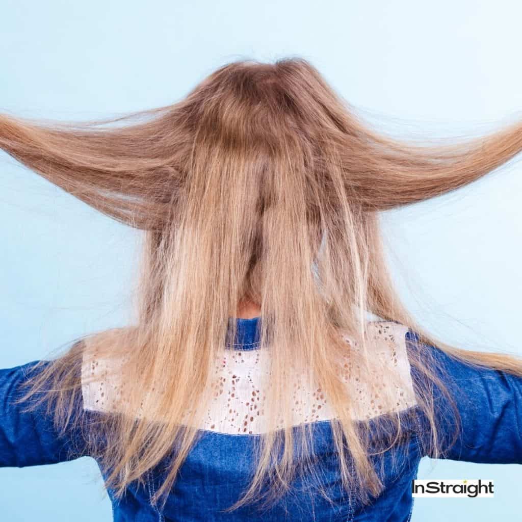 lady showing her dry hair